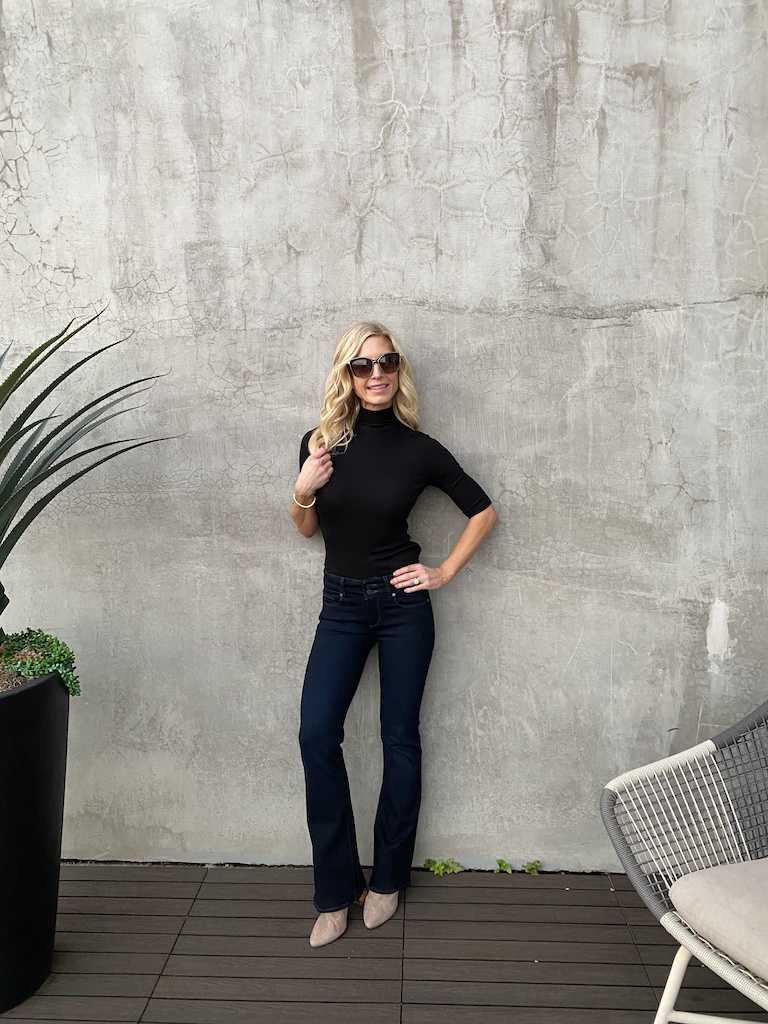 black turtleneck Chanel sunglasses high waisted blue denim jeans nude boots